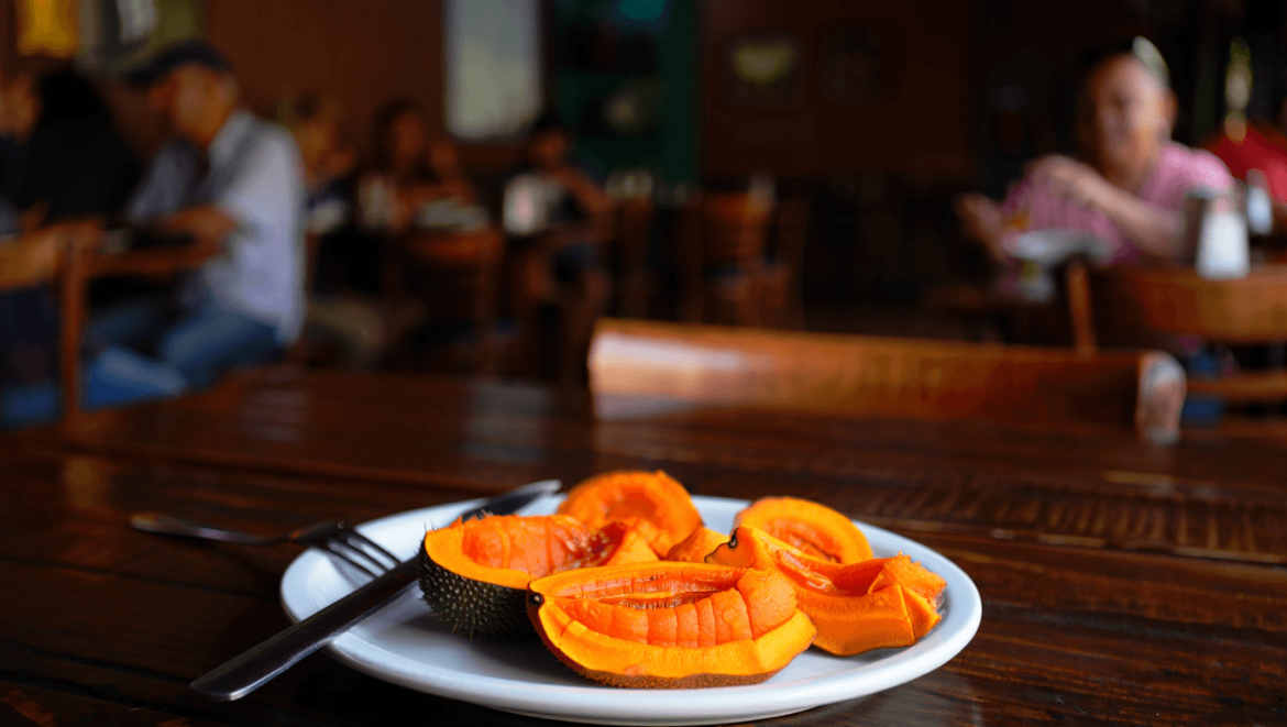 pequi fruit frying in just oil and its own moisture